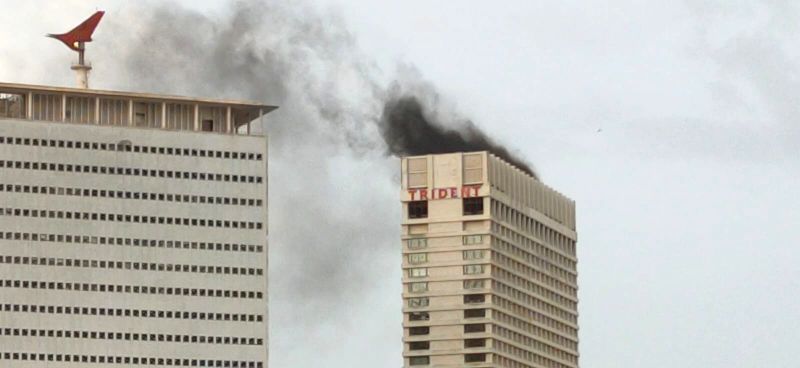 Alarm as 'smoke without fire' engulfs the Hotel Trident at Nariman Point, at dawn on Sunday.